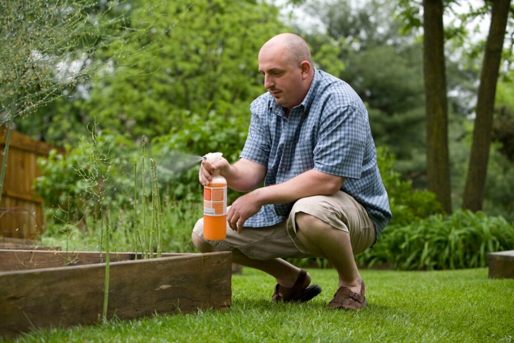 n so many ways, gardening is a very beneficial activity, not only for the environment, but for those who partake in this exercise. After properly reading the instructions, this man was in the process of applying pesticide spray to his raised-bed home garden.